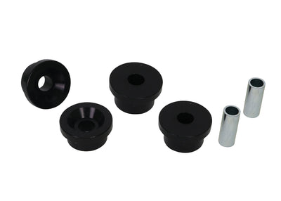 Set of black rubber bushings and metal sleeves on a white background
